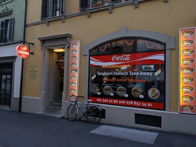 Tandoori flames Restaurant and Cafe مطعم ومقهى تندوري فليمز للمأكولات العربية - مطاعم في عجمان